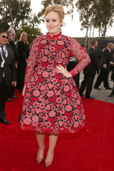I'm sorry but Adele was worst dressed at the 2013 Grammys. She wore a flower printed dress by Valentino. 