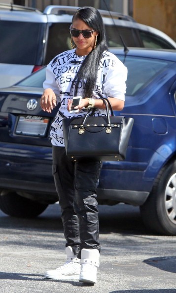 Cassies heading to Hugos Restaurant in a Brian Lichtenberg Homies White and Black Graffiti Sweatshirt and White Givenchy Sneakers