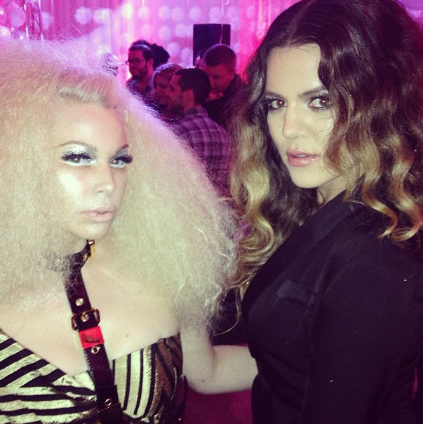 Khloe Kardashian in A.L.C. Carey Jumpsuit Giuseppe Zanotti Reptile Print Leather Metal Ankle Strap Sandals www.jinnaloves.comPic2