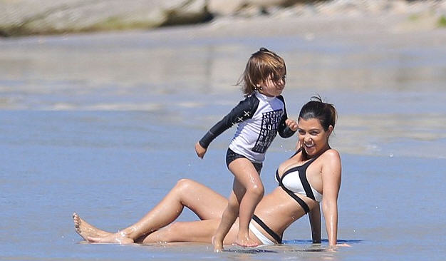 Kourtney Kardashian and Mason on the beach in Mexico www.jinnaloves.comPic 2