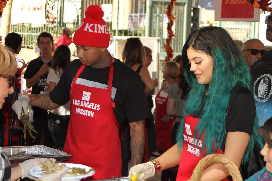 Kylie Jenner and Tyga serve Thanksgiving Dinner to the homeless 2014